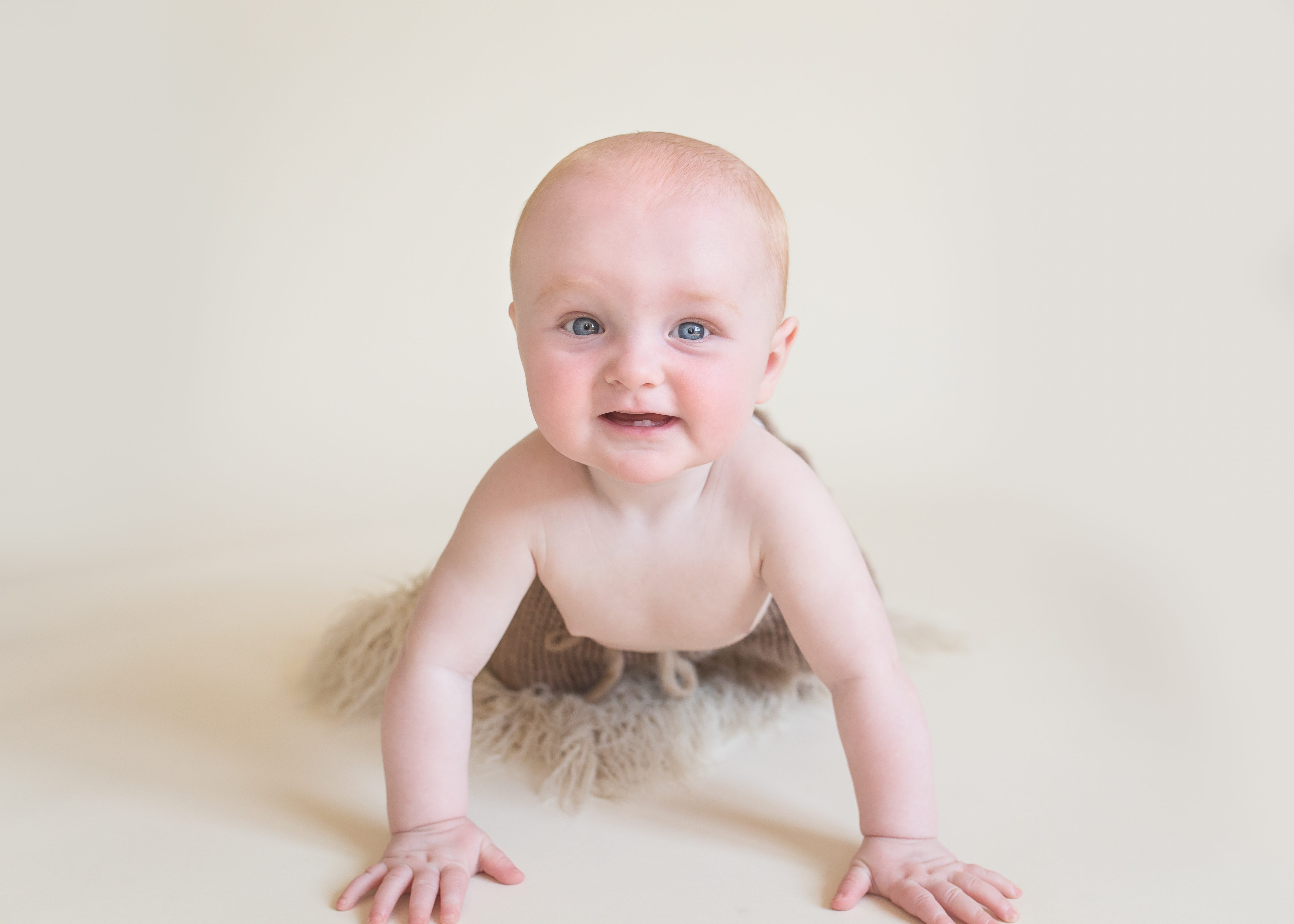 close up of baby with blue eyes