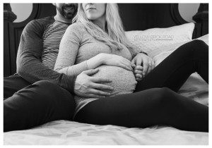 close up of expectant mother's baby belly