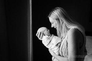Mom holding new baby