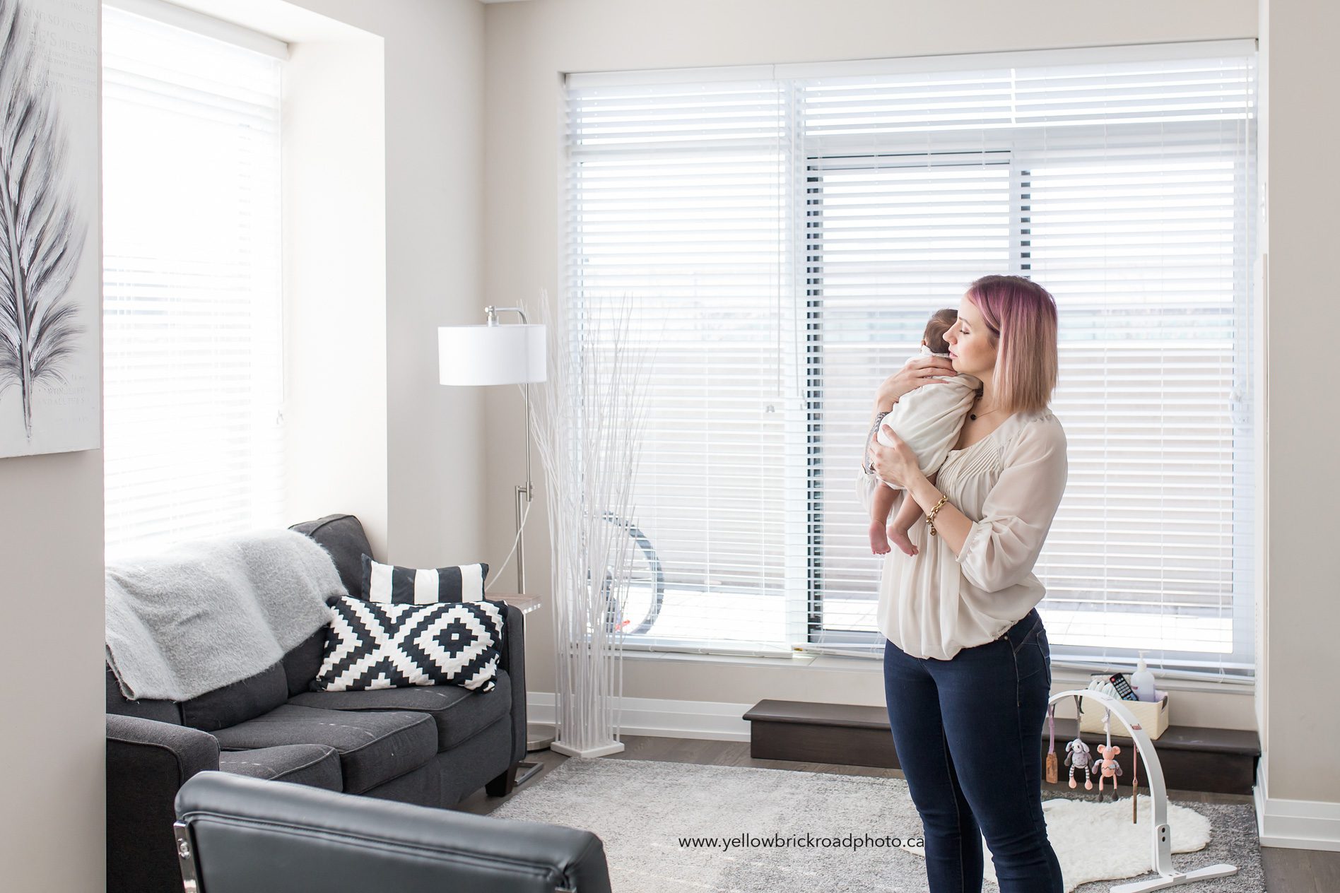 Waterloo newborn Photographer mom holding baby