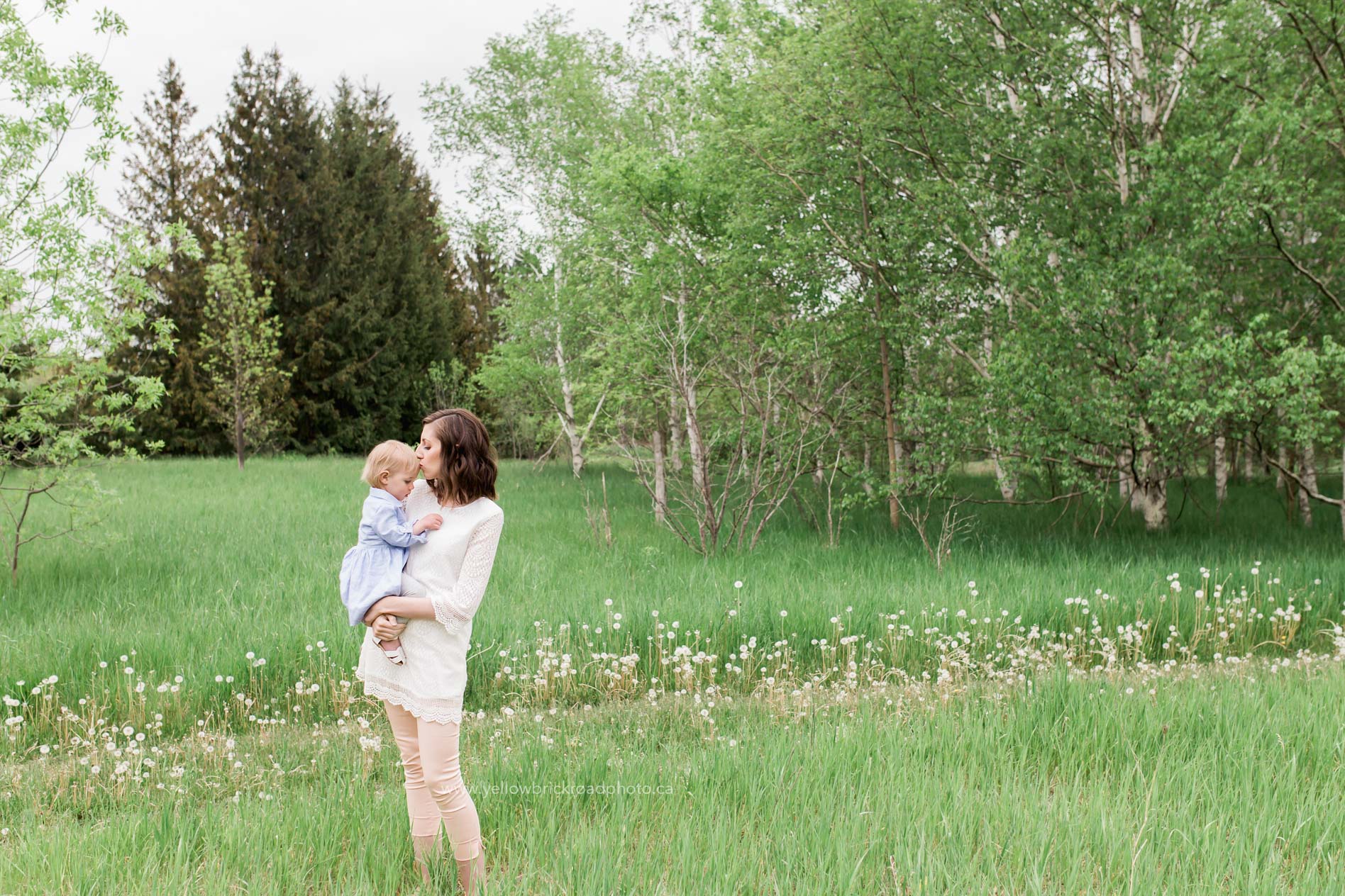 Breslau Family photographer mom and daughter hugging