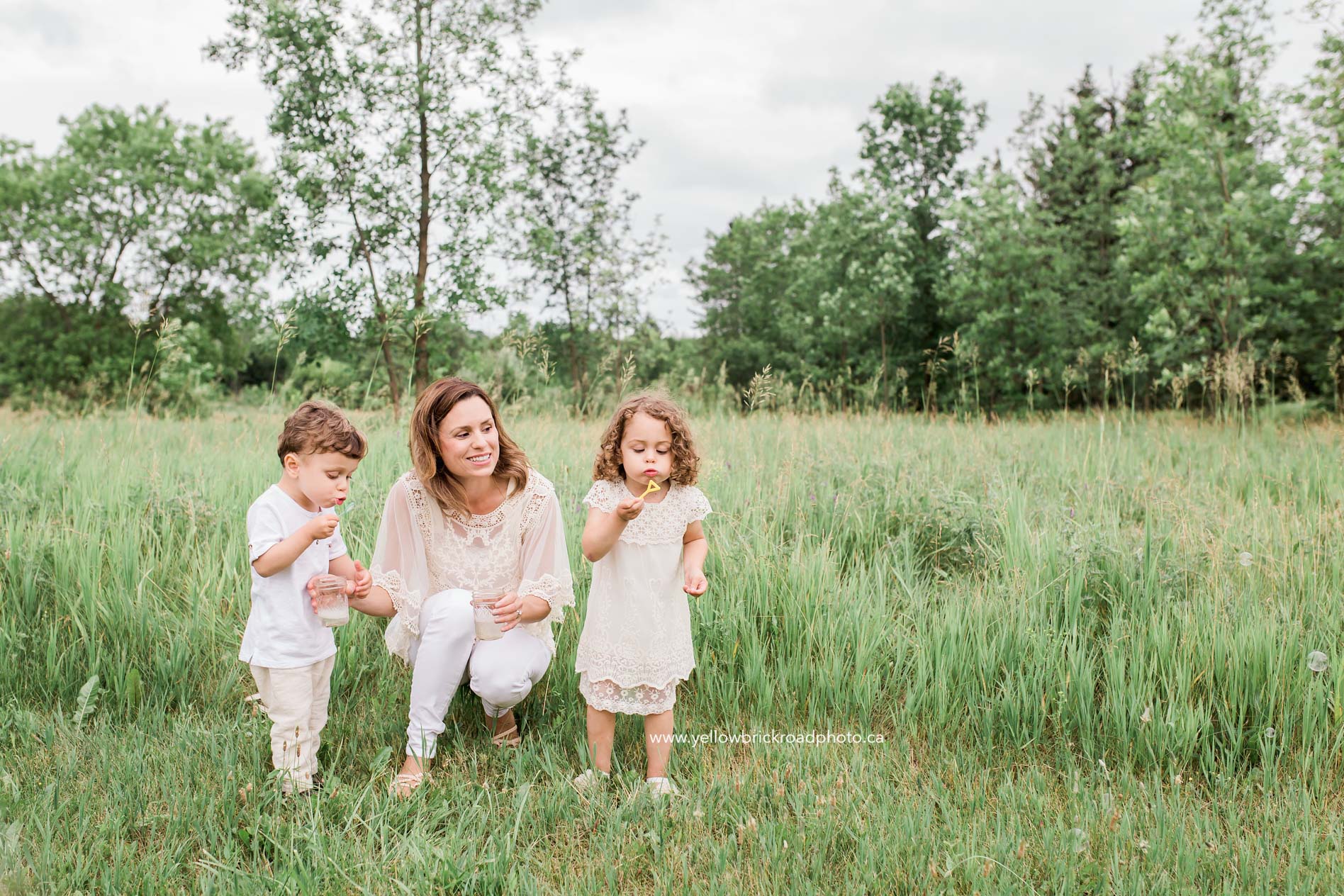 Guelph Family Photos with family blowing bubbles
