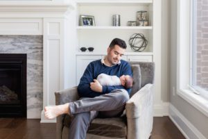 guelph Newborn Photography dad holding newborn daughter