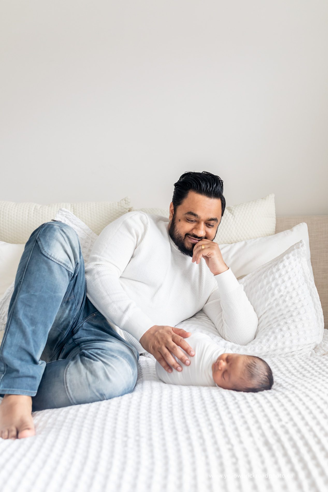 dad admiring baby girl