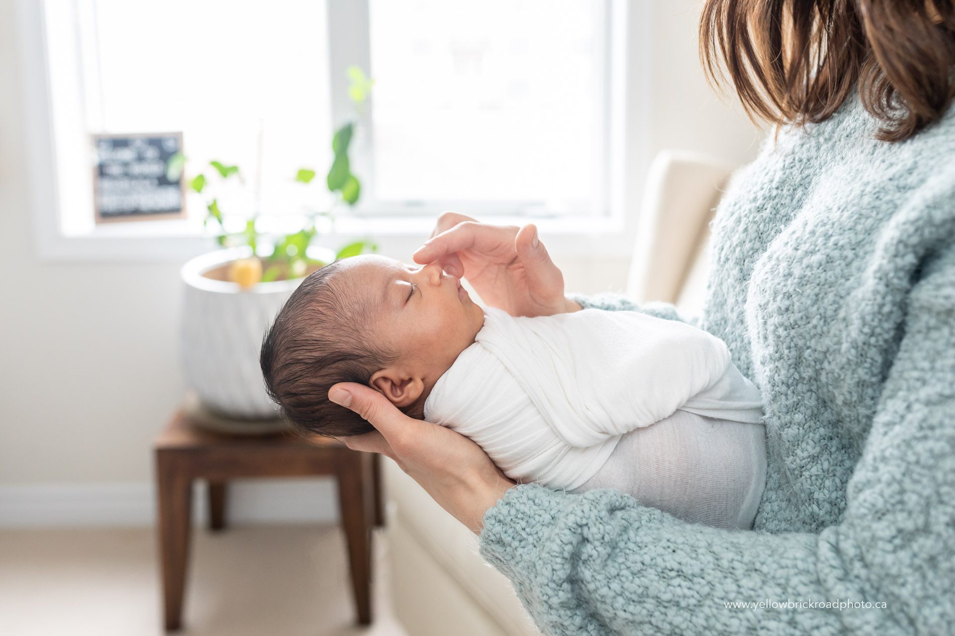 baby and mom during newborn session