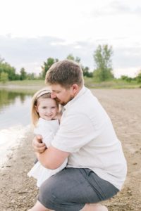 Beach Family Session hugging on the beach