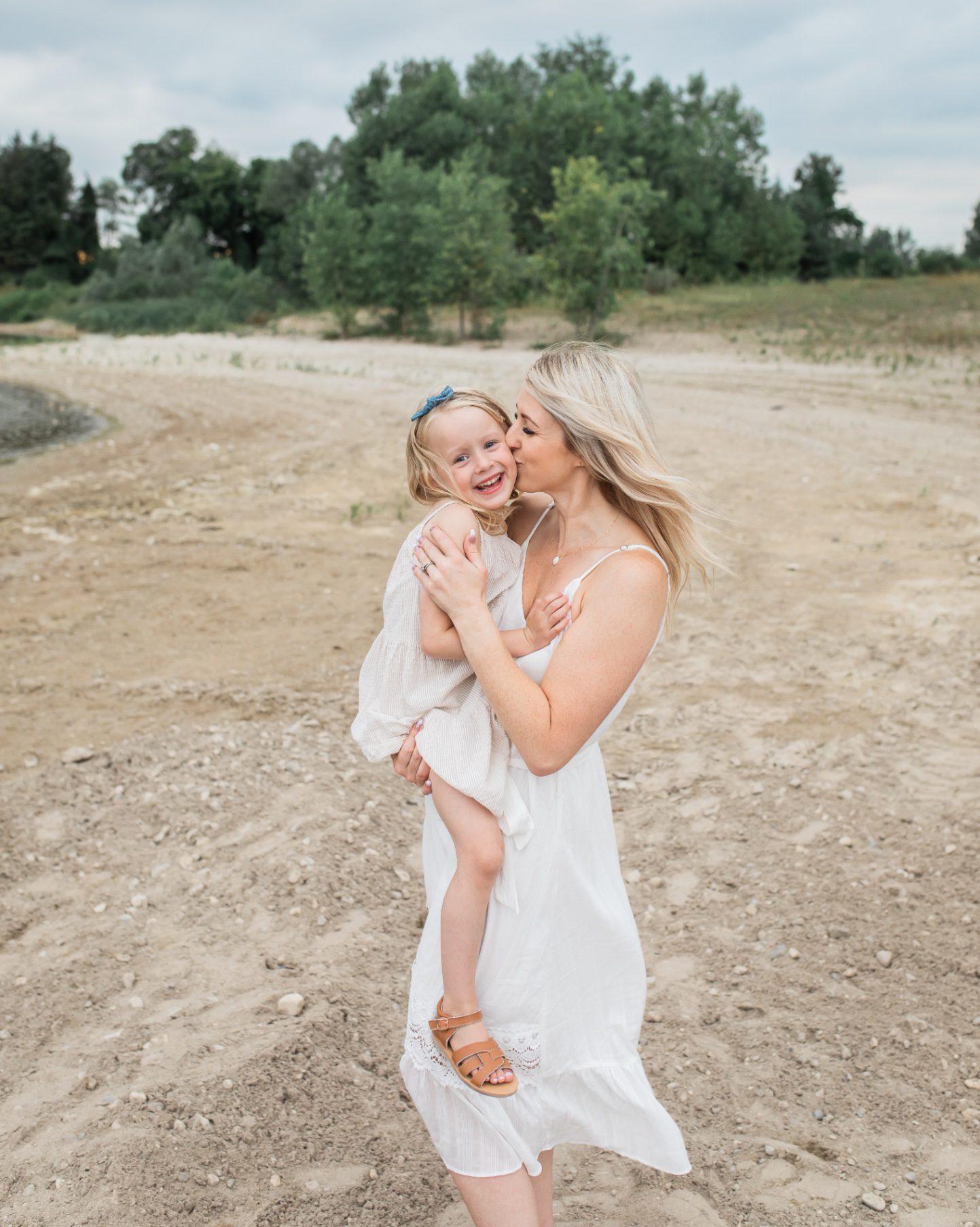 mom and daughter beach during family photography session
