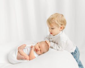 newborn photos with big brother
