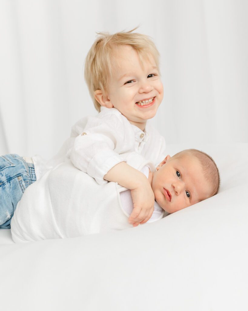 newborn photos with new big brother