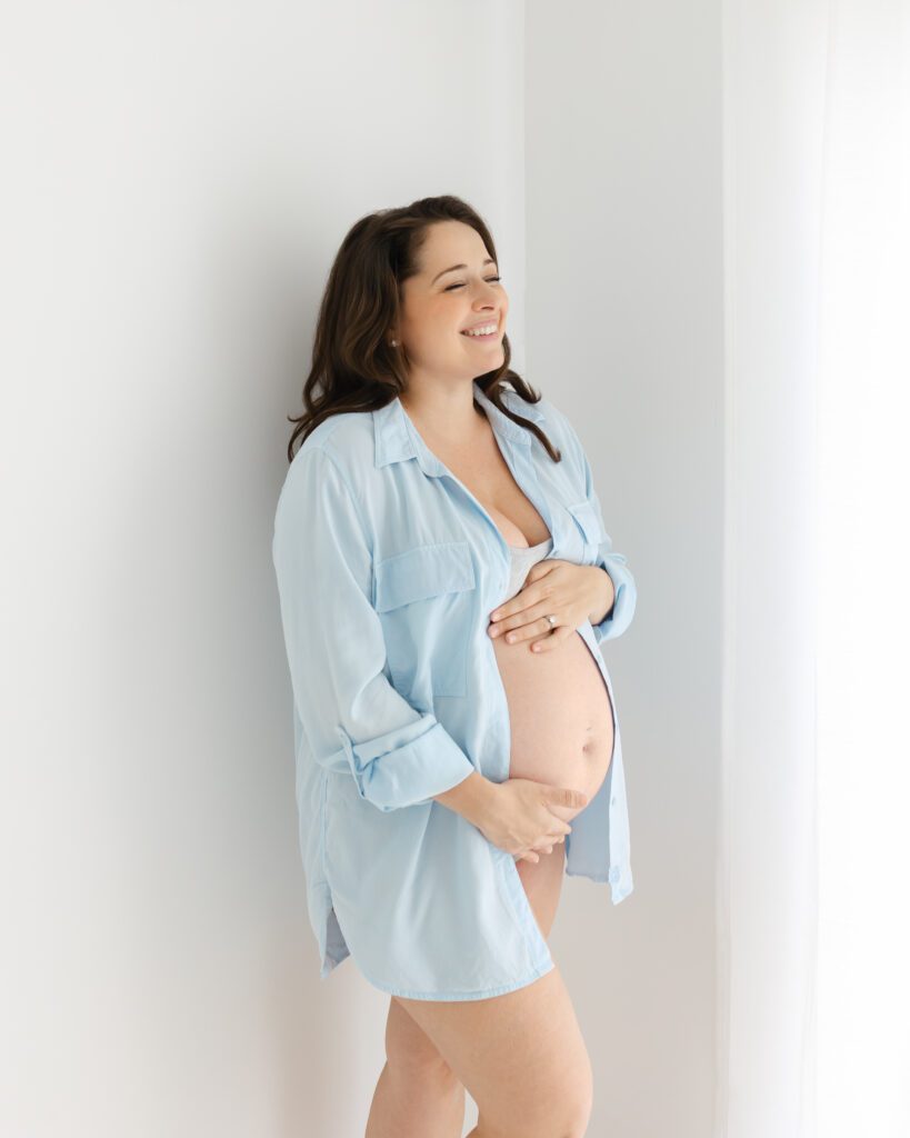 Emotional maternity portrait capturing anticipation and love in Guelph photography studio